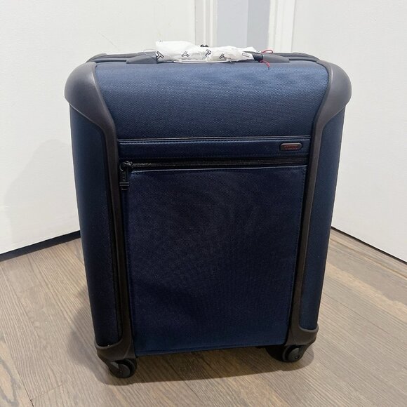TUMI Continental Expandable Softside Spinner 4-Wheeled Carry-On, Blue/ Black - Picture 1 of 13